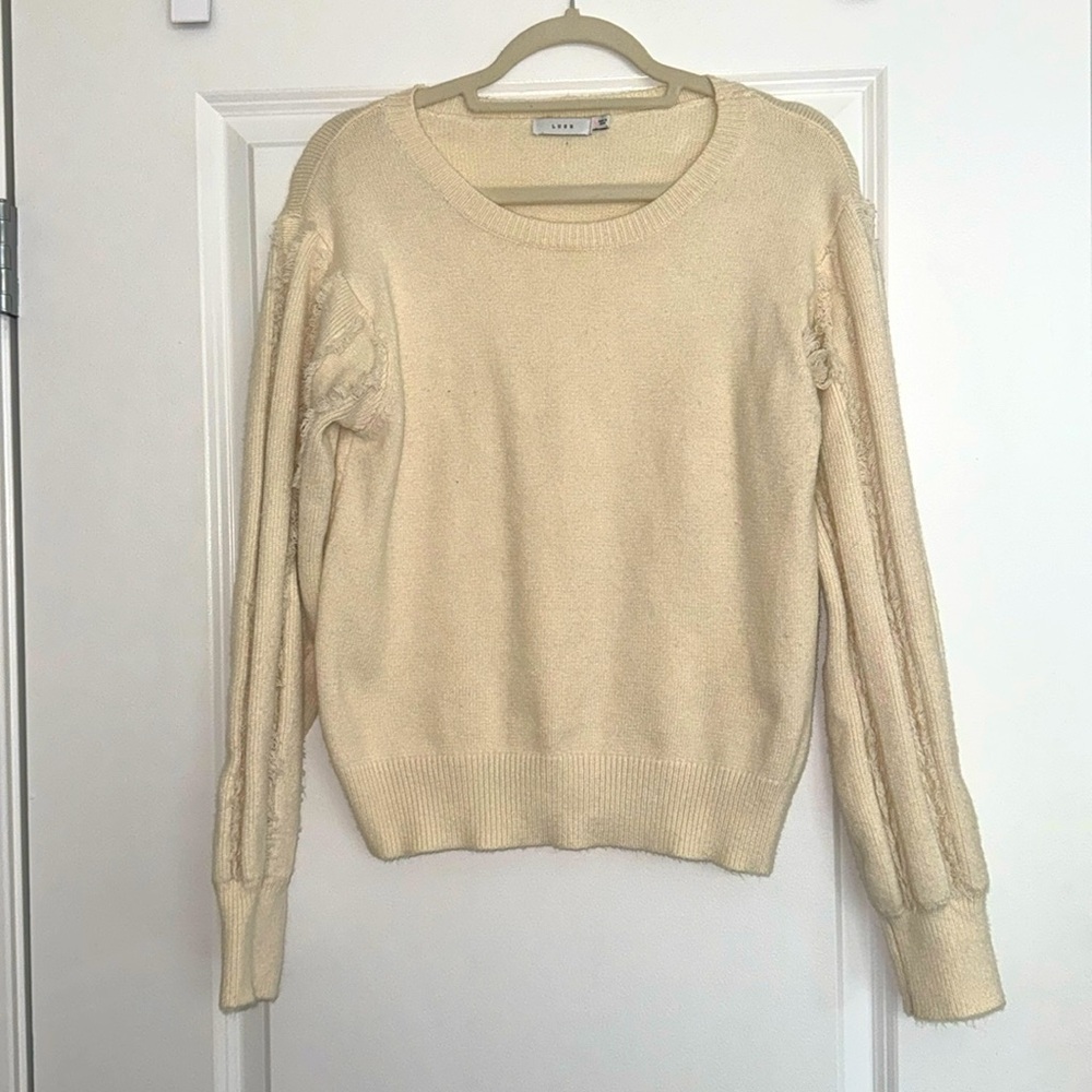 Cream eyelash accented sleeve sweater